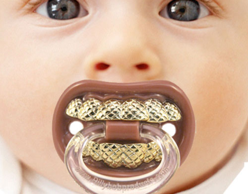 tetine dents en or bebe