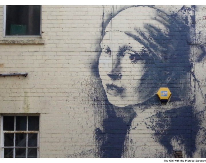 Banksy fille au tympa perce