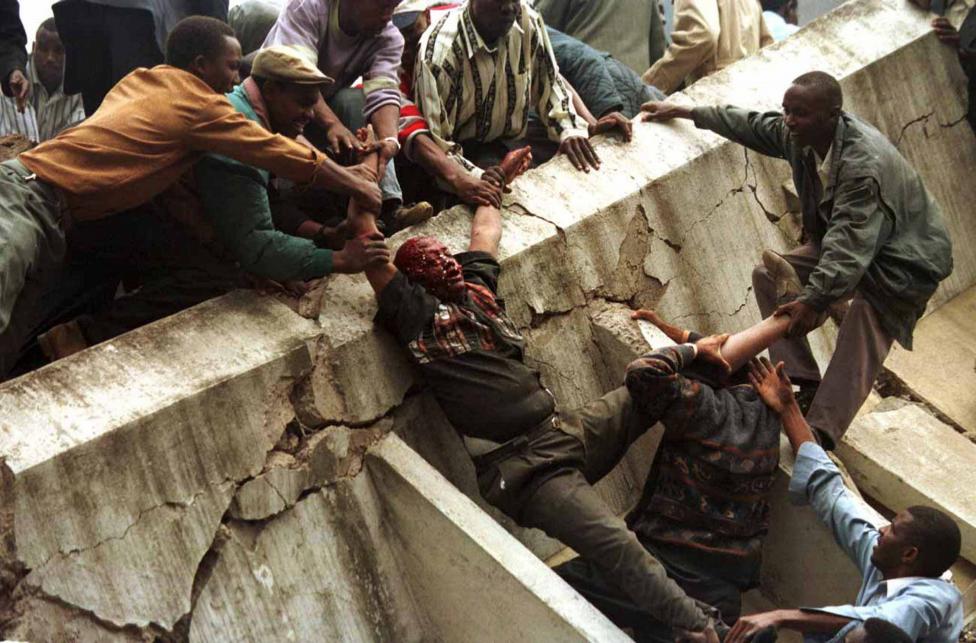 File photo of a body being removed from the wreckage after a bomb went off in Nairobi