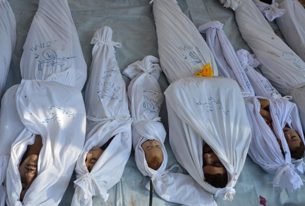 File photo of bodies of people activists say were killed by nerve gas in the Ghouta region as seen in the Duma neighbourhood of Damascus