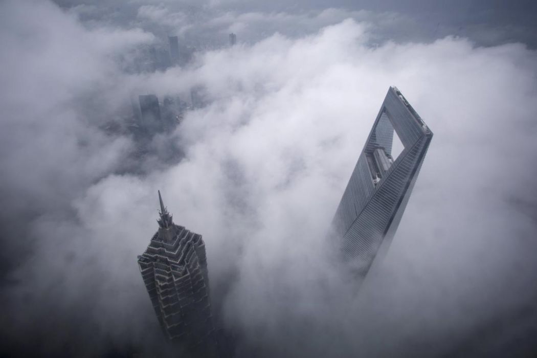 photo shanghai tete dans les nuages