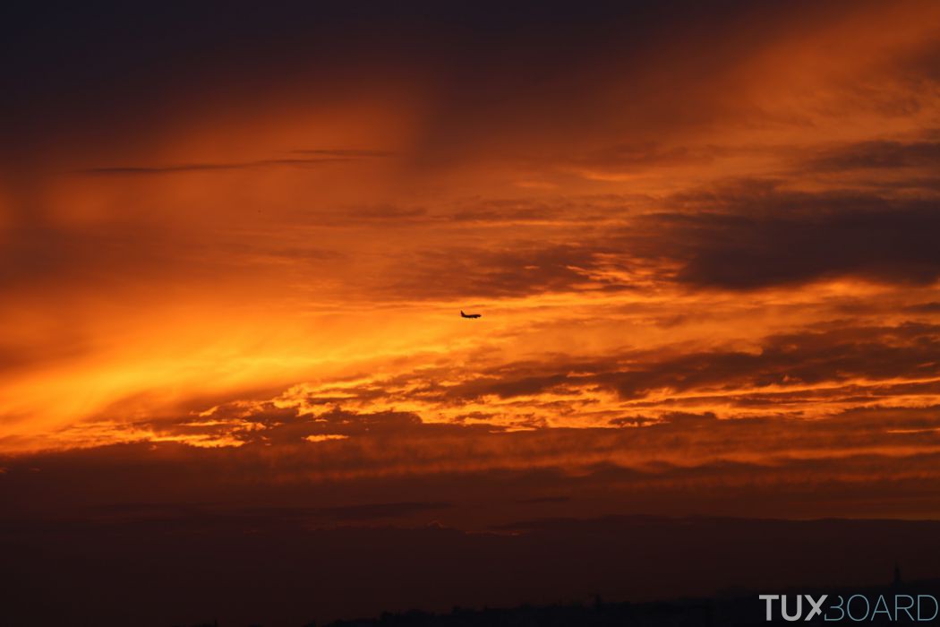 coucher de soleil et avion Lisbonne