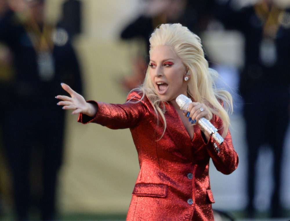 Feb 7, 2016; Santa Clara, CA, USA; Recording artist Lady Gaga performs the national anthem before Super Bowl 50 between the Carolina Panthers and the Denver Broncos at Levi's Stadium. Mandatory Credit: Robert Hanashiro-USA TODAY Sports ORG XMIT: USATSI-245820 ORIG FILE ID: 20160207_jla_usa_104.jpg