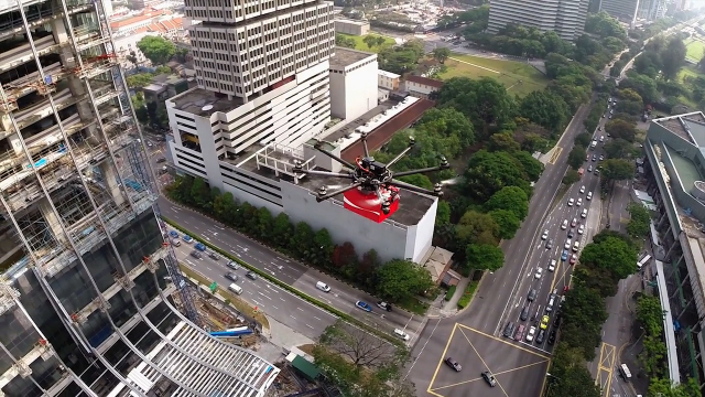 livraison coca cola drone travailleurs singapour