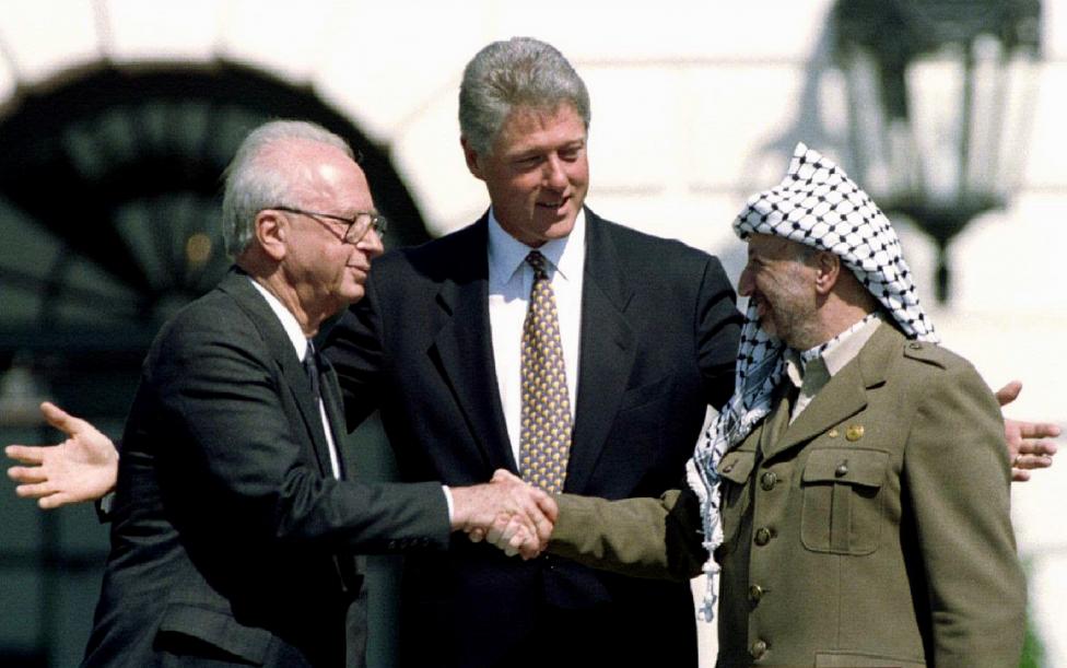 File photo of U.S. President Clinton with Israeli Prime Minister Rabin and PLO President Yasser Arafat
