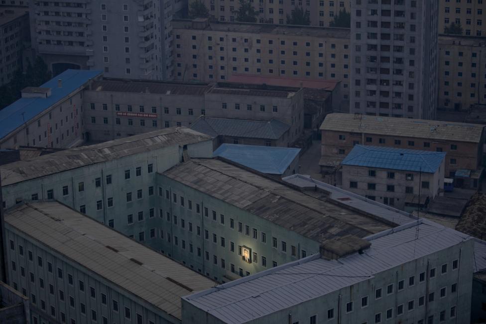 File photo shows a picture of North Korea's founder Kim Il-sung on a building in the capital Pyongyang