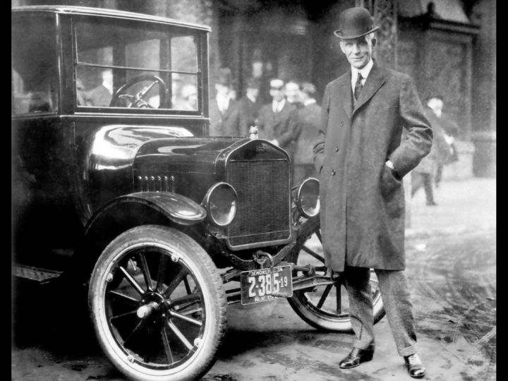 While other auto makers wanted to design luxury cars, Henry Ford designed a car that anyone could afford. Here he is standing by that very car. From the collections of The Henry Ford and Ford Motor Company.
