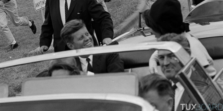 President John F. Kennedy, first lady Jacqueline Kennedy and Texas Gov. John Connally are shown as their limousine heads for Air Force One at Brooks Air Force Base in San Antonio, Nov. 21, 1963. The president and his entourage were heading to Houston. (AP Photo)