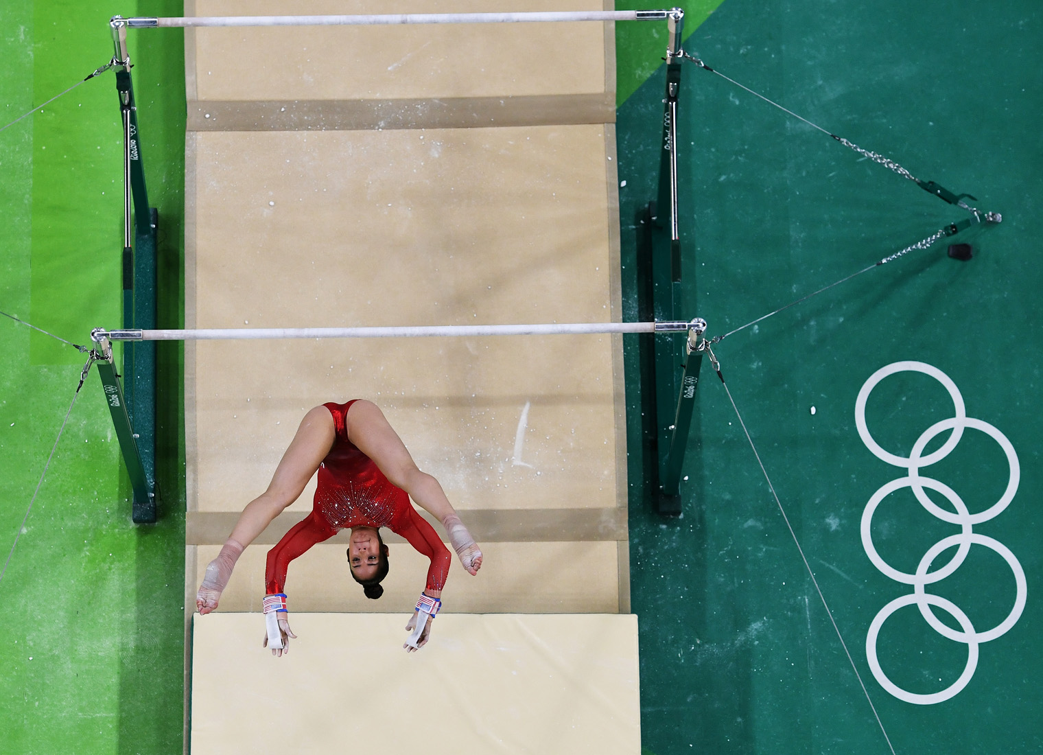 RIO DE JANEIRO, BRAZIL - AUGUST 11: Alexandra Raisman of the United States competes on the uneven bars during the Women's Individual All Around Final on Day 6 of the 2016 Rio Olympics at Rio Olympic Arena on August 11, 2016 in Rio de Janeiro, Brazil. (Photo by Richard Heathcote/Getty Images)