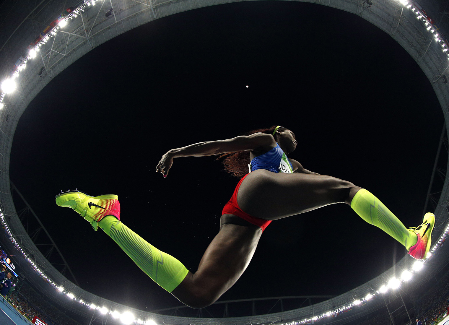 Colombia's Caterine Ibarguen competes in the Women's Triple Jump Final during the athletics event at the Rio 2016 Olympic Games at the Olympic Stadium in Rio de Janeiro on August 14, 2016. / AFP / Adrian DENNIS (Photo credit should read ADRIAN DENNIS/AFP/Getty Images)