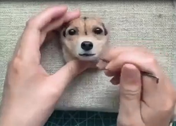 Une miniature d'une tête de chien