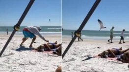 Un homme s’amuse à attirer les oiseaux sur une femme qui profitait du soleil et de la plage