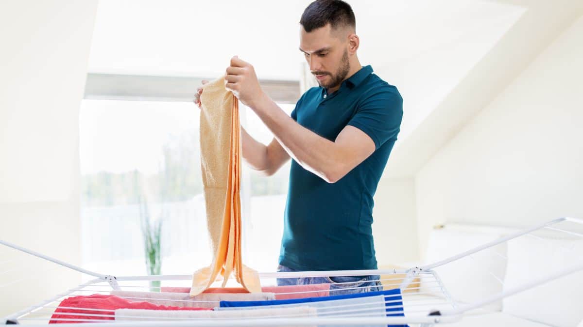 Ce réglage secret sur la machine à laver va sécher tout le linge plus ...